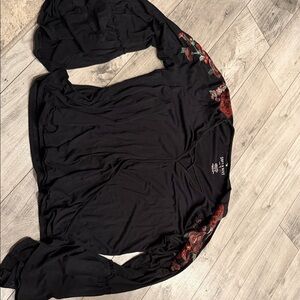 Stylish Black Blouse with Floral Accents